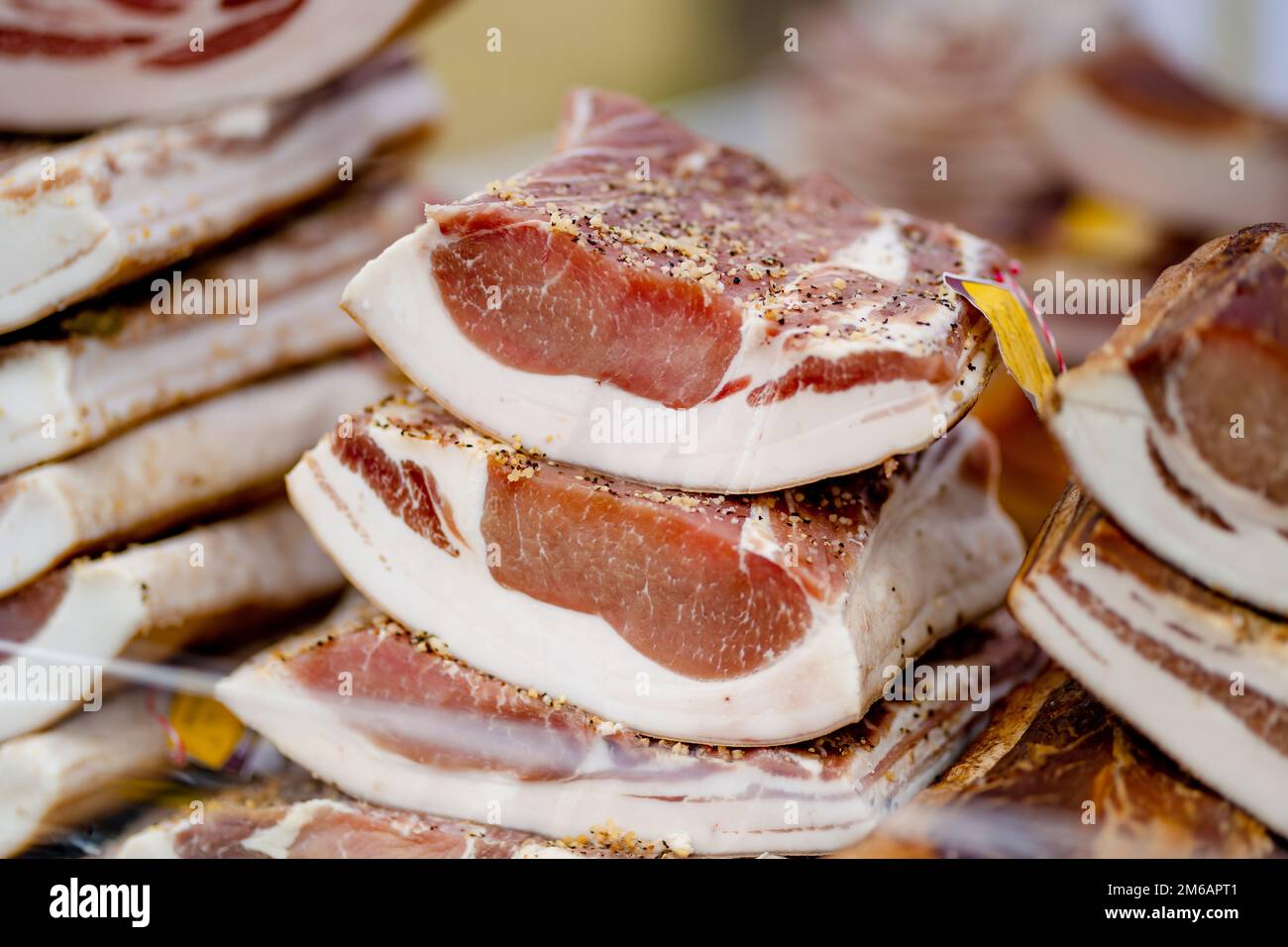 Selection of assorted home made meats, jerky and sausages on a farmers