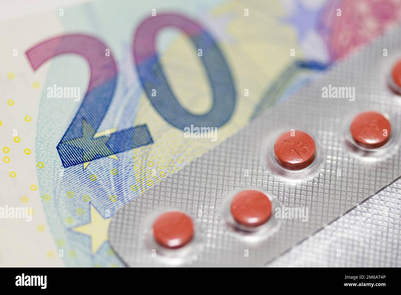 Tablets, blister packaging, medicines, banknotes, symbol image, medical costs, costs Stock Photo