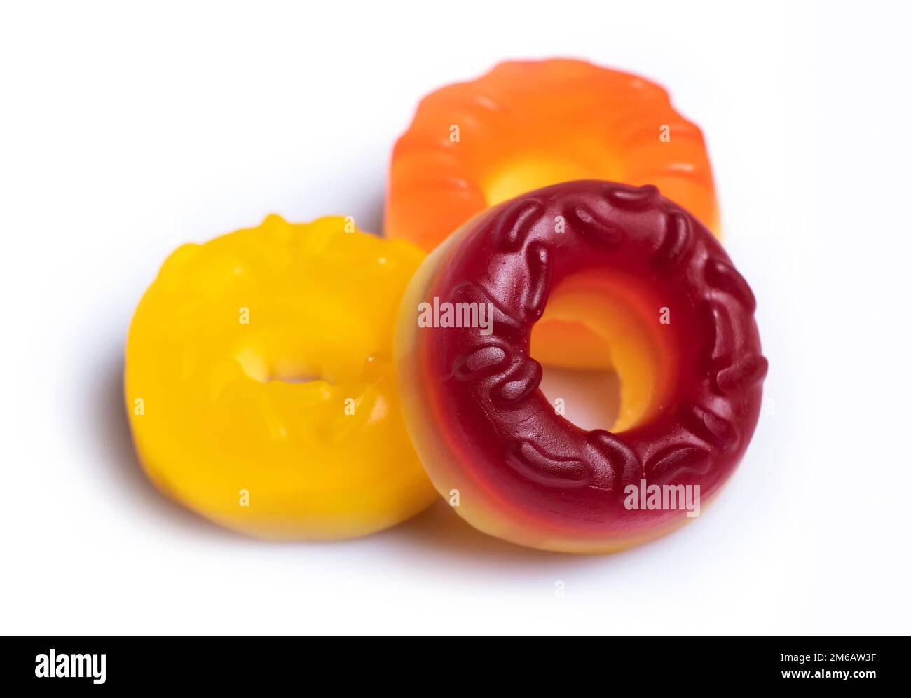 Multicolored jelly candy donuts on a white background. Stock Photo