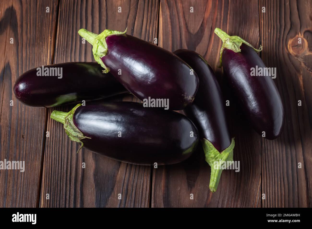 Frsh organic eggplant on the wooden boards. Stock Photo