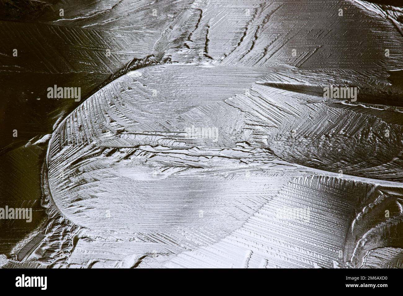 Creative photo. Patterns on a frozen lake Stock Photo