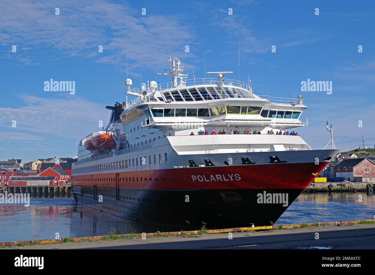 Hurtigruten ship turns in the harbour of Vardoe, transport, mail ship