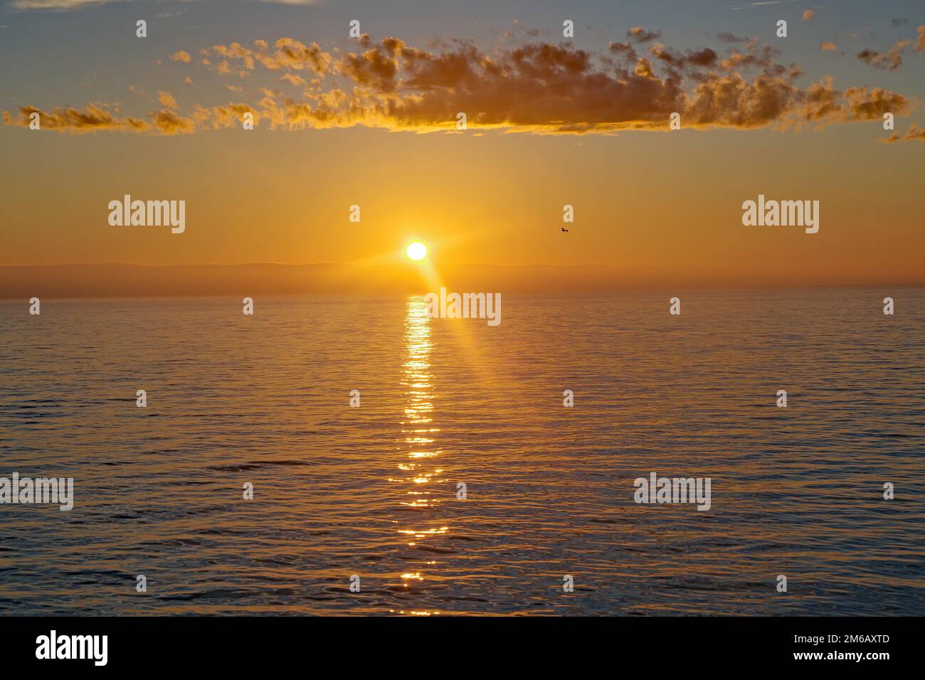 Sunset over the Arctic Ocean in late summer, Mehamm, Arctic, Lapland, Finnmark, Norway Stock Photo