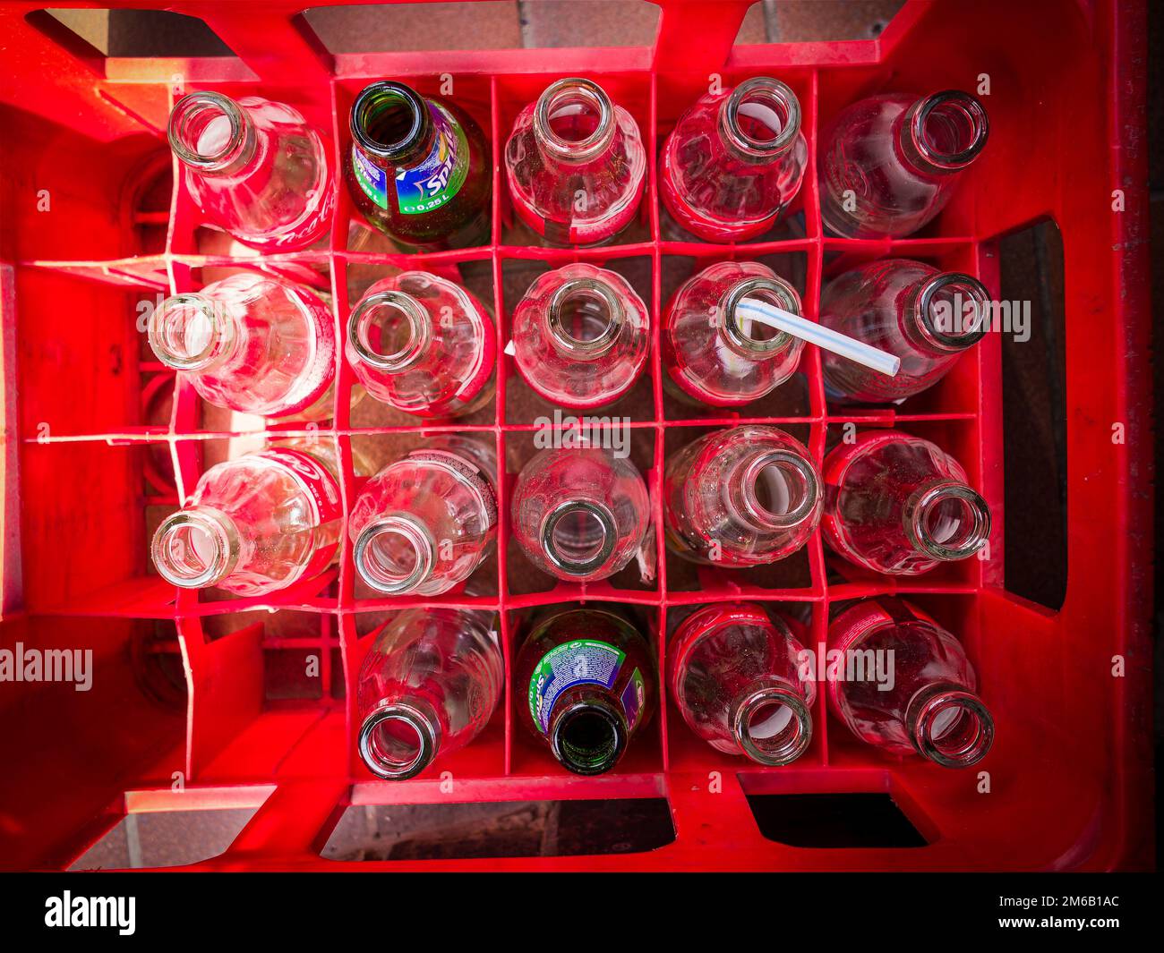 Red box with different empty CocaCola bottles Stock Photo Alamy