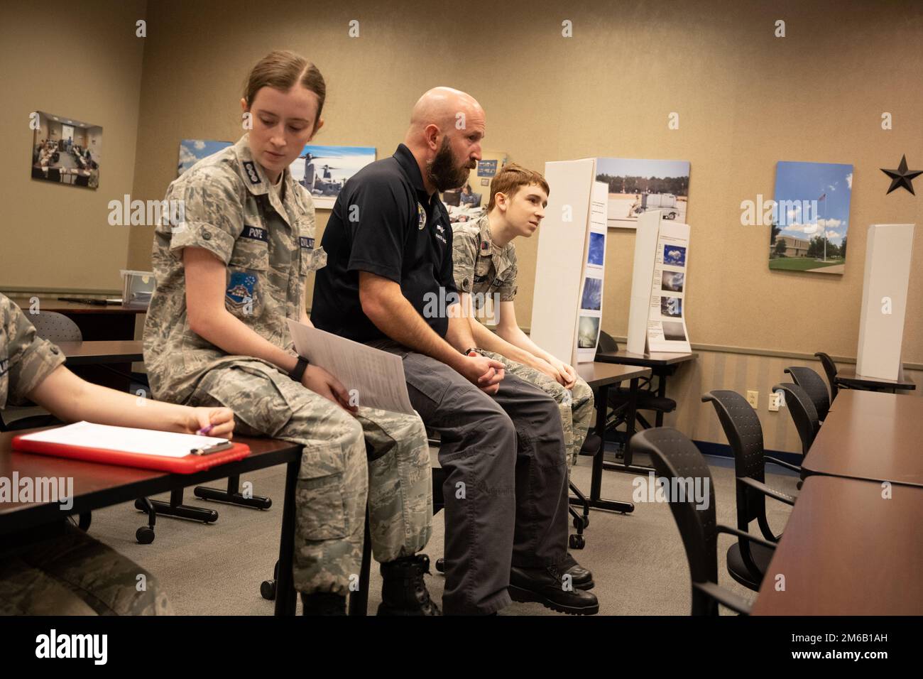 U.S. Air Force 18th Combat Weather Squadron Airmen discuss meterology