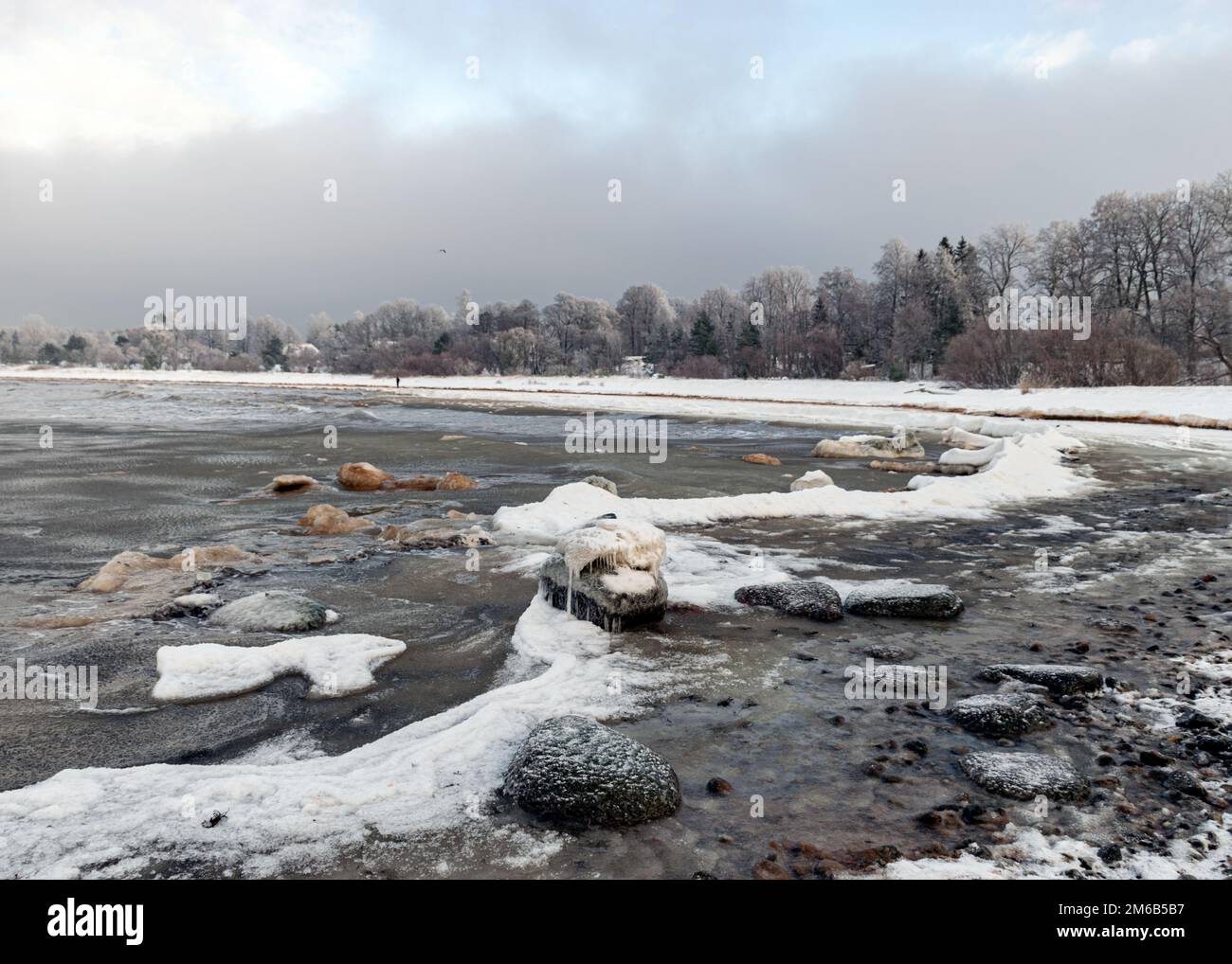 different ice formations on rocks on the seashore, ice texture, wind ...
