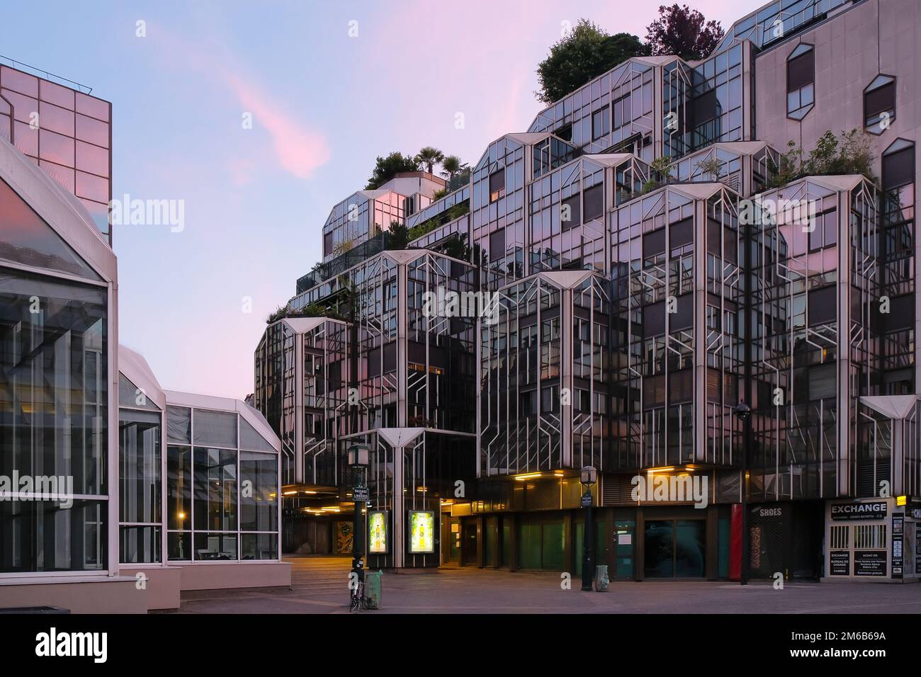 Paris, France - Passage des Lingères at dusk in Les Halles quarter. Modern apartment exterior. Steel and glass building design. Horizontal background. Stock Photo