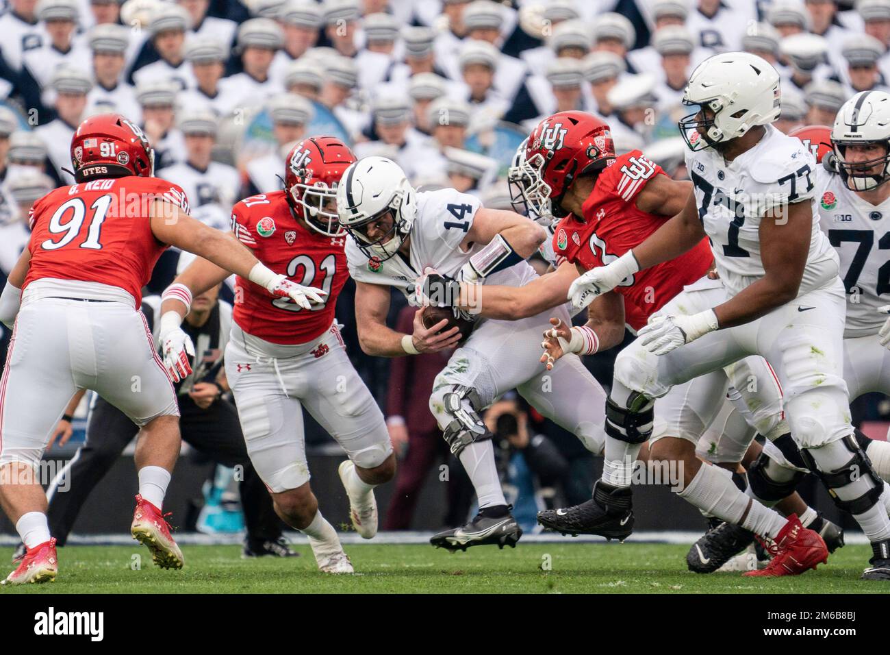 Penn State Nittany Lions quarterback Sean Clifford (14) is tackled during the 109th Rose Bowl football game against the Utah Utes, Monday, January 2, Stock Photo