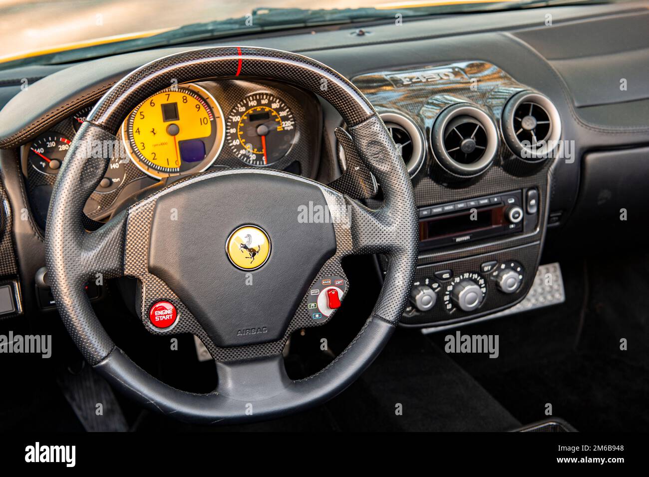 Interior view of the cockpit of the supercar Ferrari F430 Spyder sports car. Stock Photo