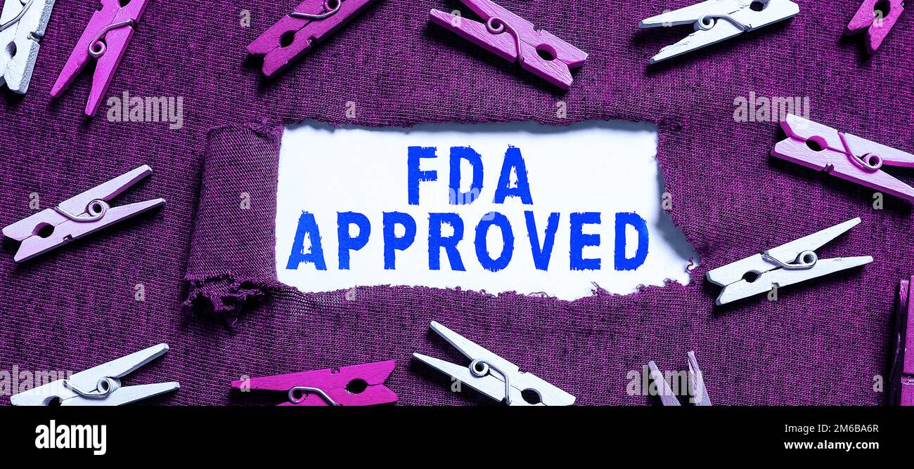 Hand writing sign Fda Approved. Concept meaning FDA agreed the product