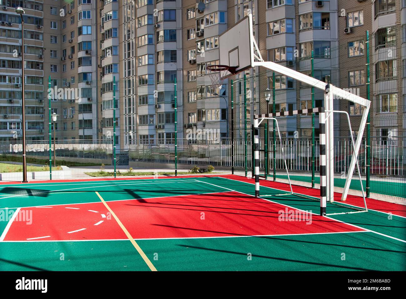 Empty basketball court in public playground Stock Photo Alamy