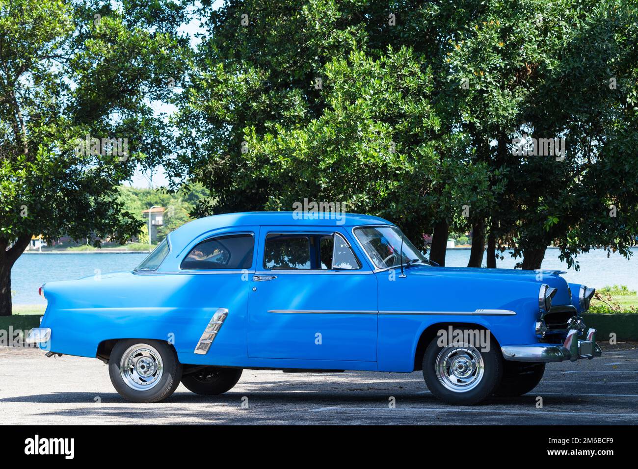 Parked blue vintage car hi-res stock photography and images - Alamy