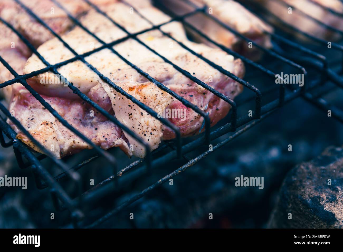 Over Cooked Grill Ribs Pork ribs cooked on the grill Stock Photo - Alamy