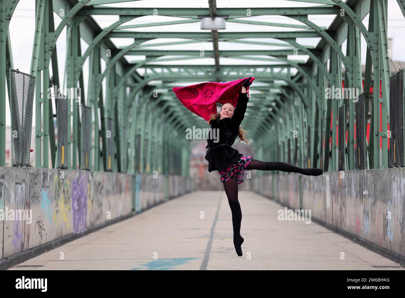Ballerina dancing on bridge hi-res stock photography and images - Alamy
