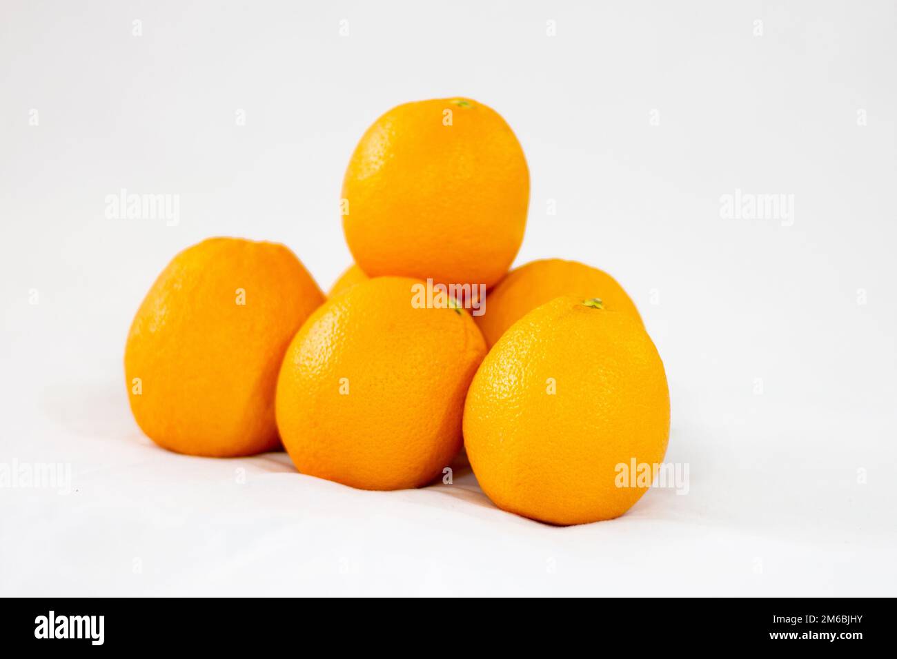 6 Oranges Image group of oranges on white background Stock Photo - Alamy