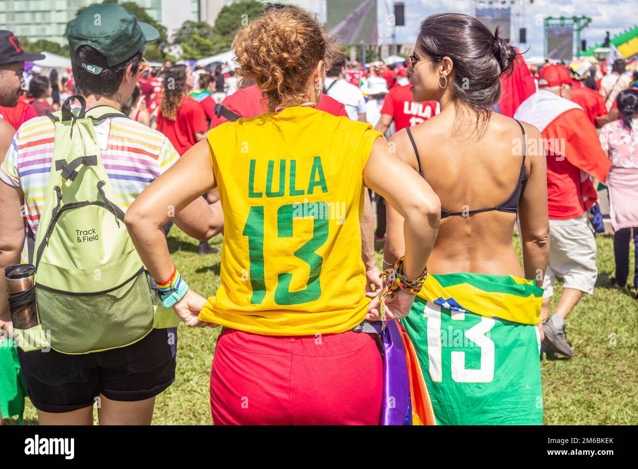 Brasília, DF, Brazil – January 01, 2023: Two women walking in shirts with the number 13 on them. Photo taken at the inauguration event. Stock Photo