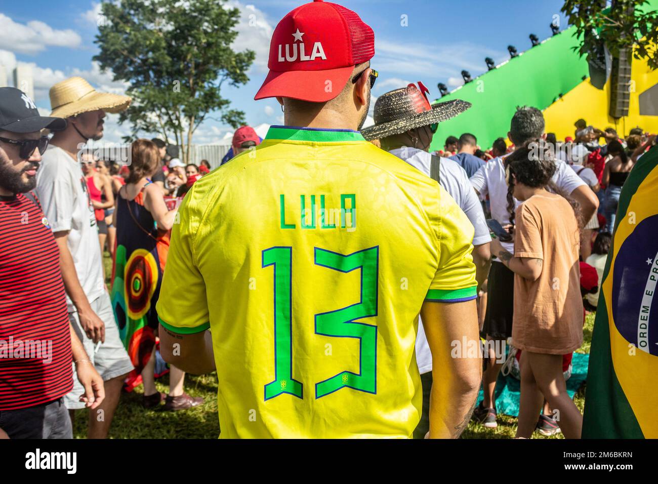 Brasília, DF, Brazil – January 01, 2023: A boy in a red cap and a yellow T-shirt with the number 13 on it. Photo taken at the inauguration. Stock Photo