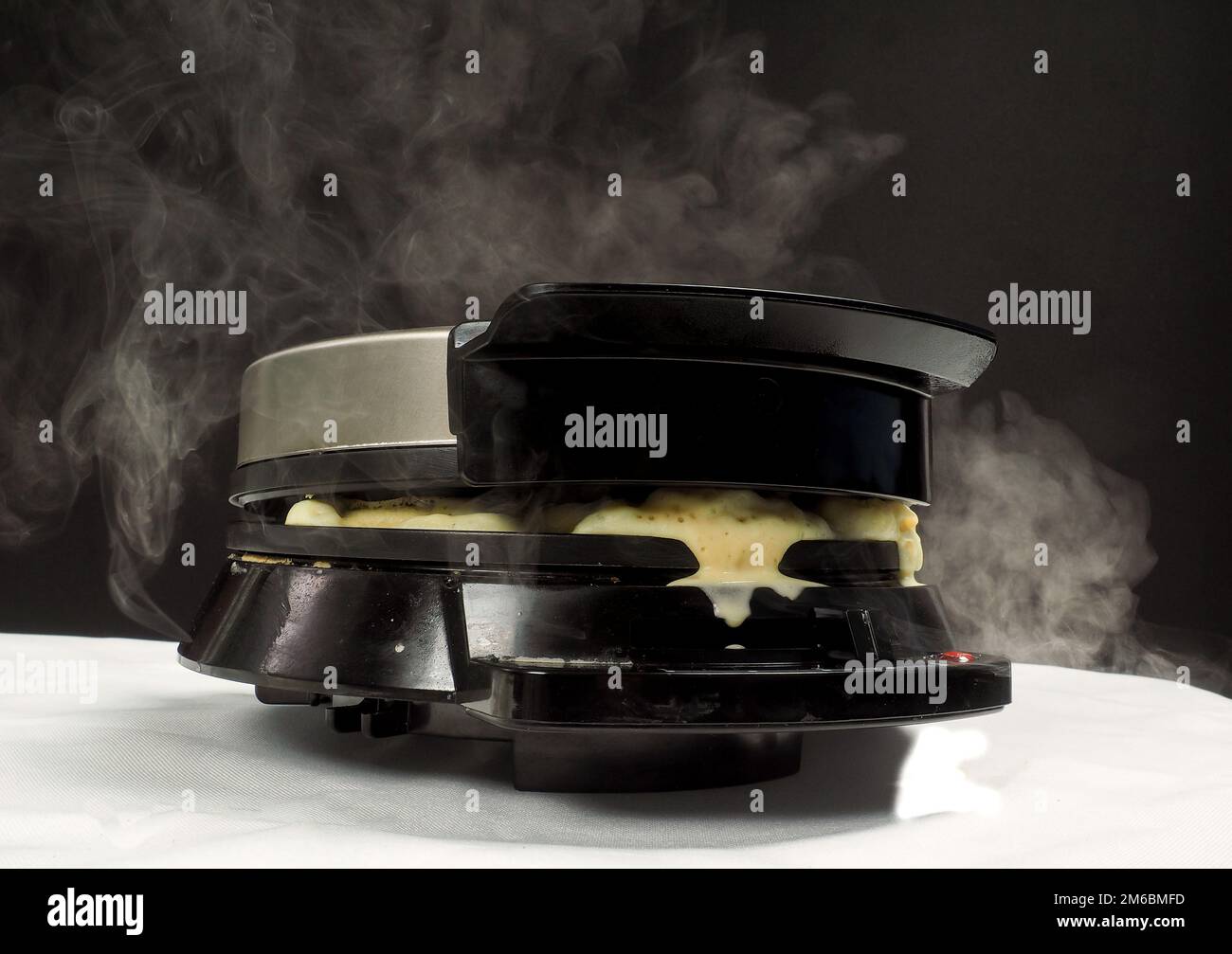 Steam from waffle maker Stock Photo Alamy