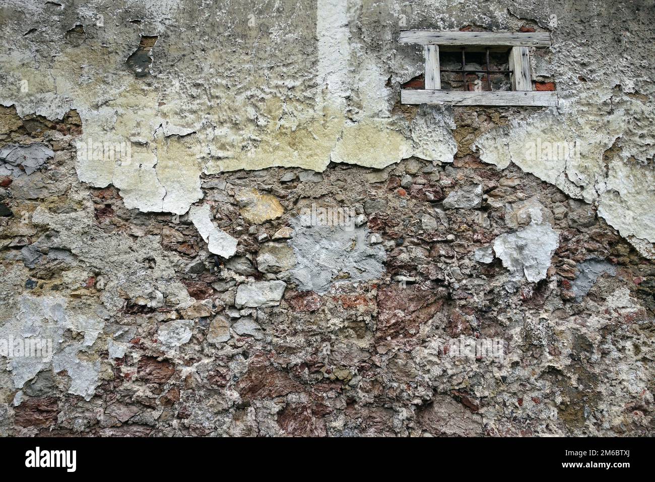 Close up view of crumbling plaster brick wall Stock Photo Alamy