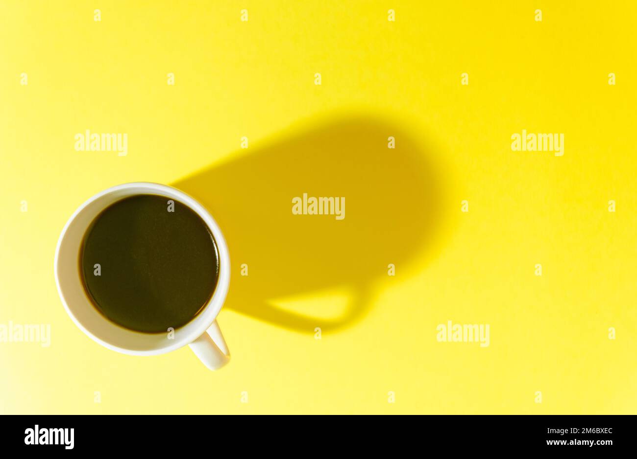 coffee cup on yellow background Stock Photo