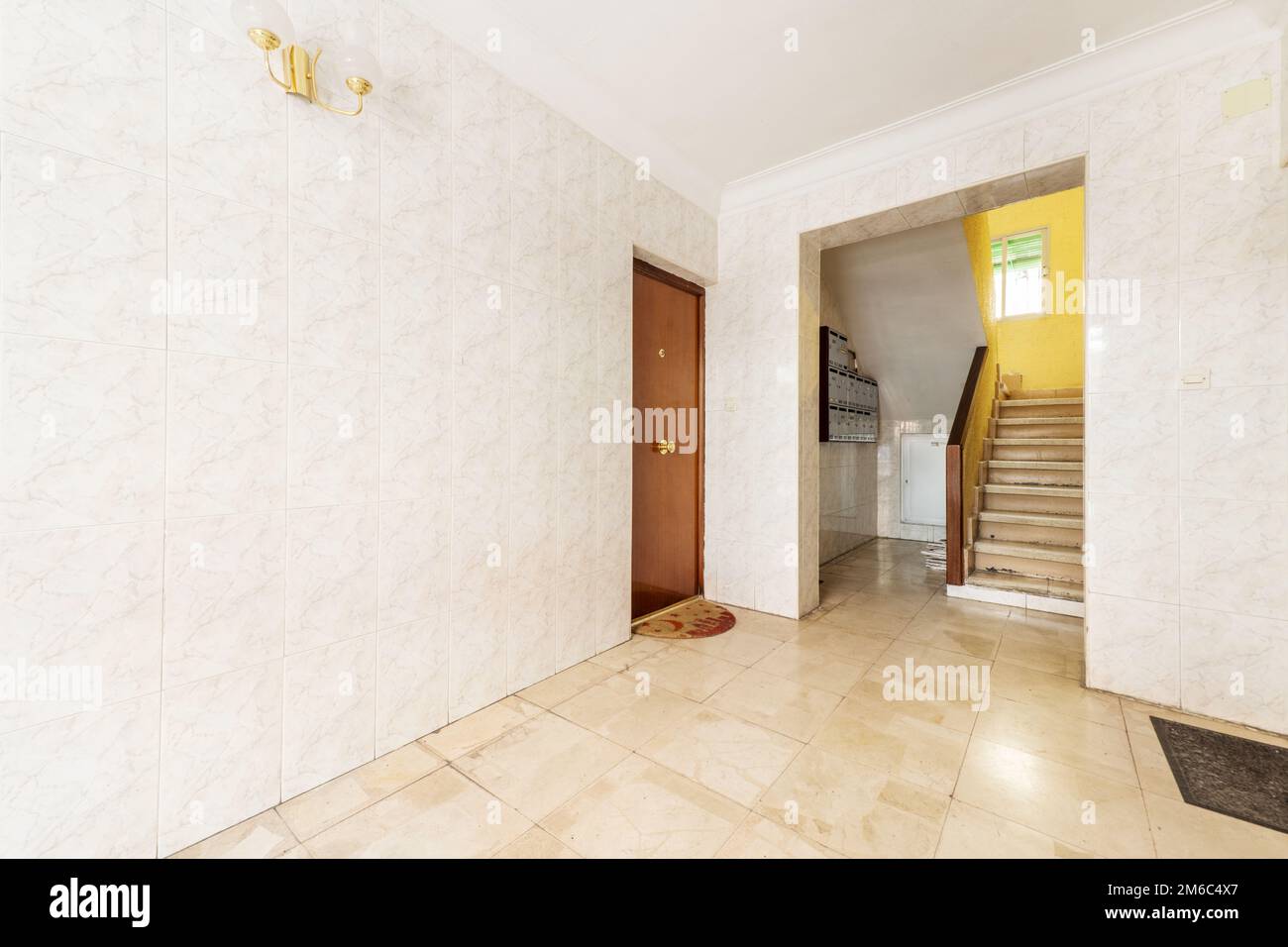 Portal of an old apartment building without elevator Stock Photo Alamy