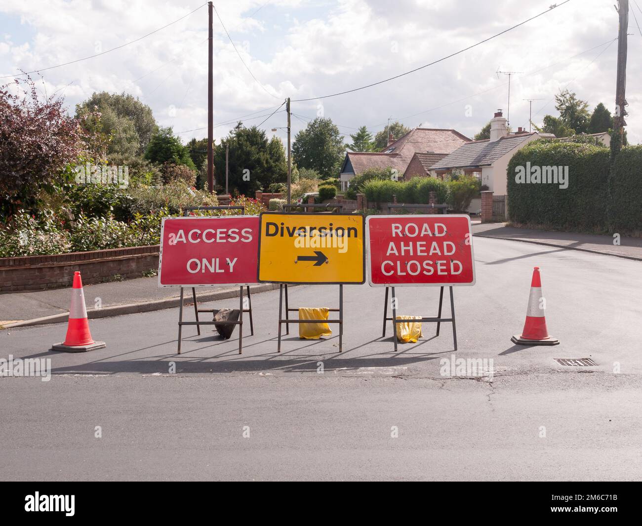 Road works road blocked signs and traffic cones diversion access only Stock Photo