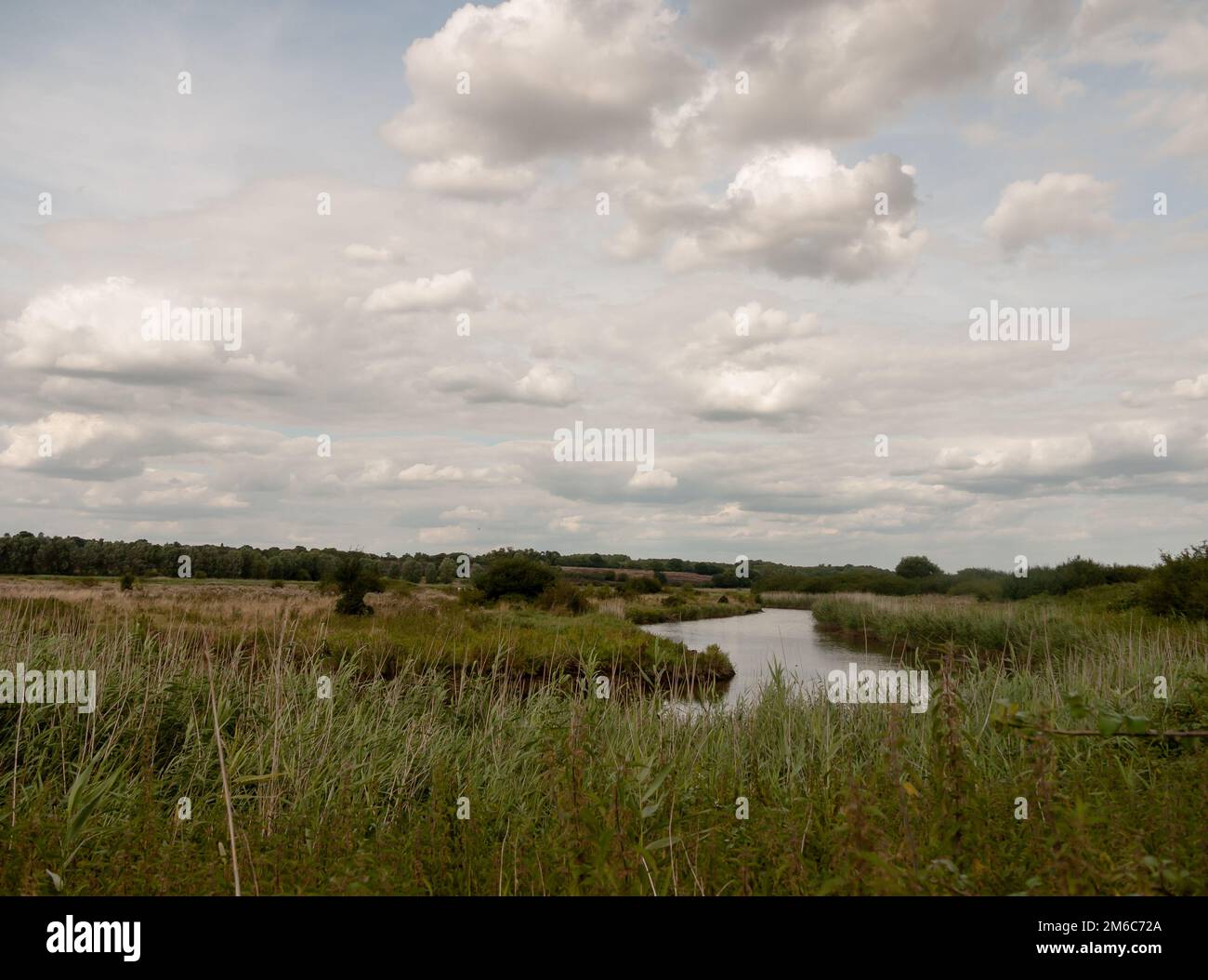 River running through grassland country walk stunning Stock Photo Alamy