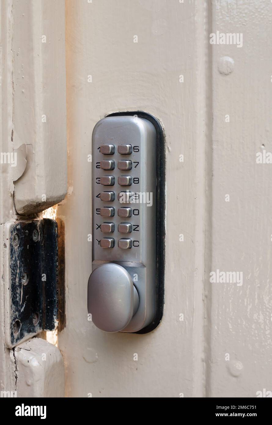 Close up of door lock metal code numbers protection Stock Photo