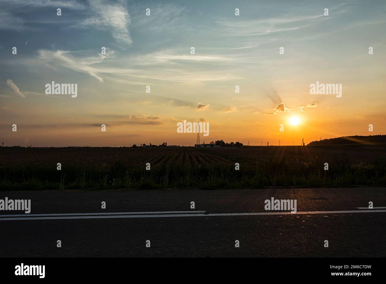 Sunset in the Cirrus clouds Stock Photo