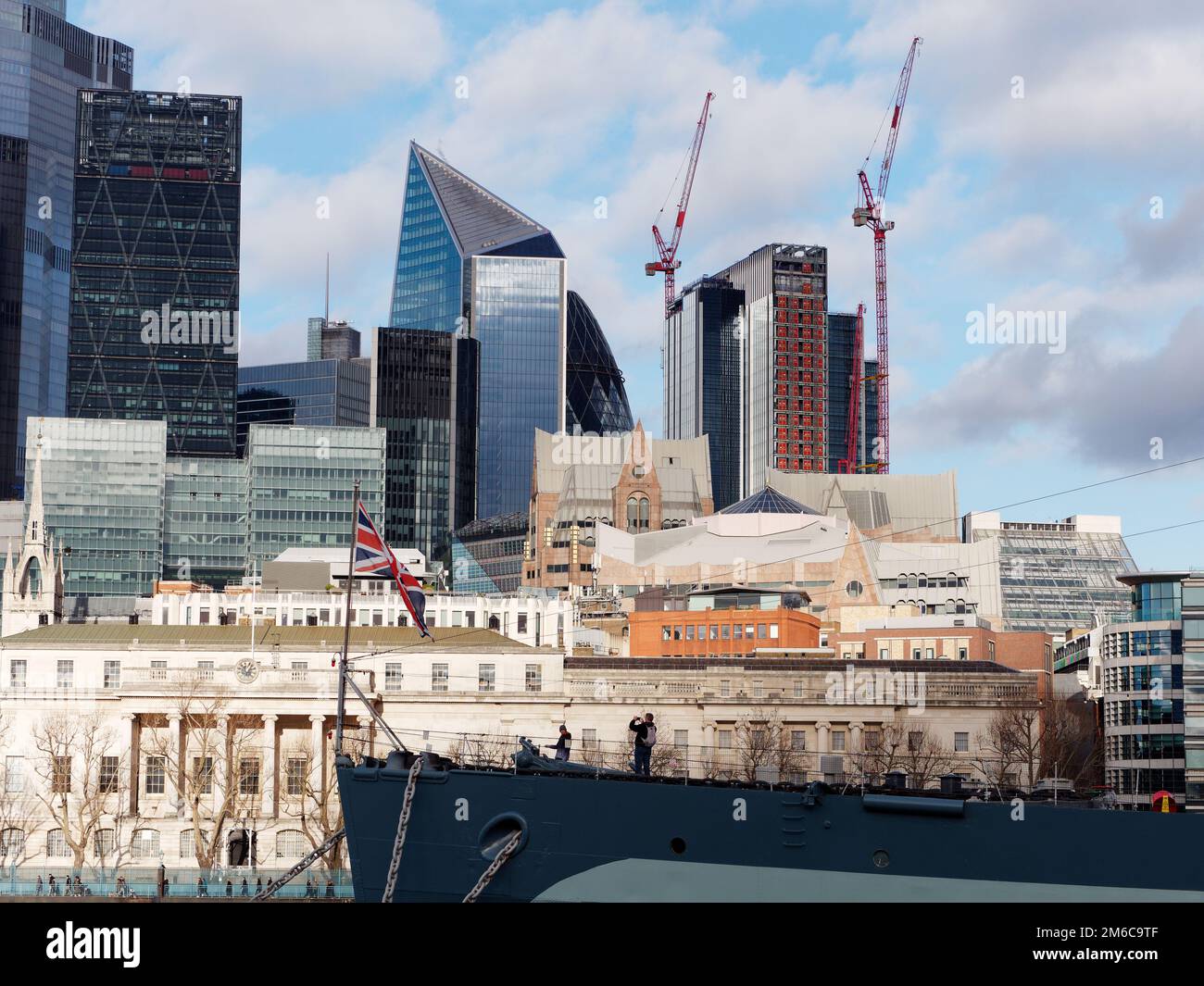 London modern buildings with the tip of HMS Belfast in the foreground. Stock Photo