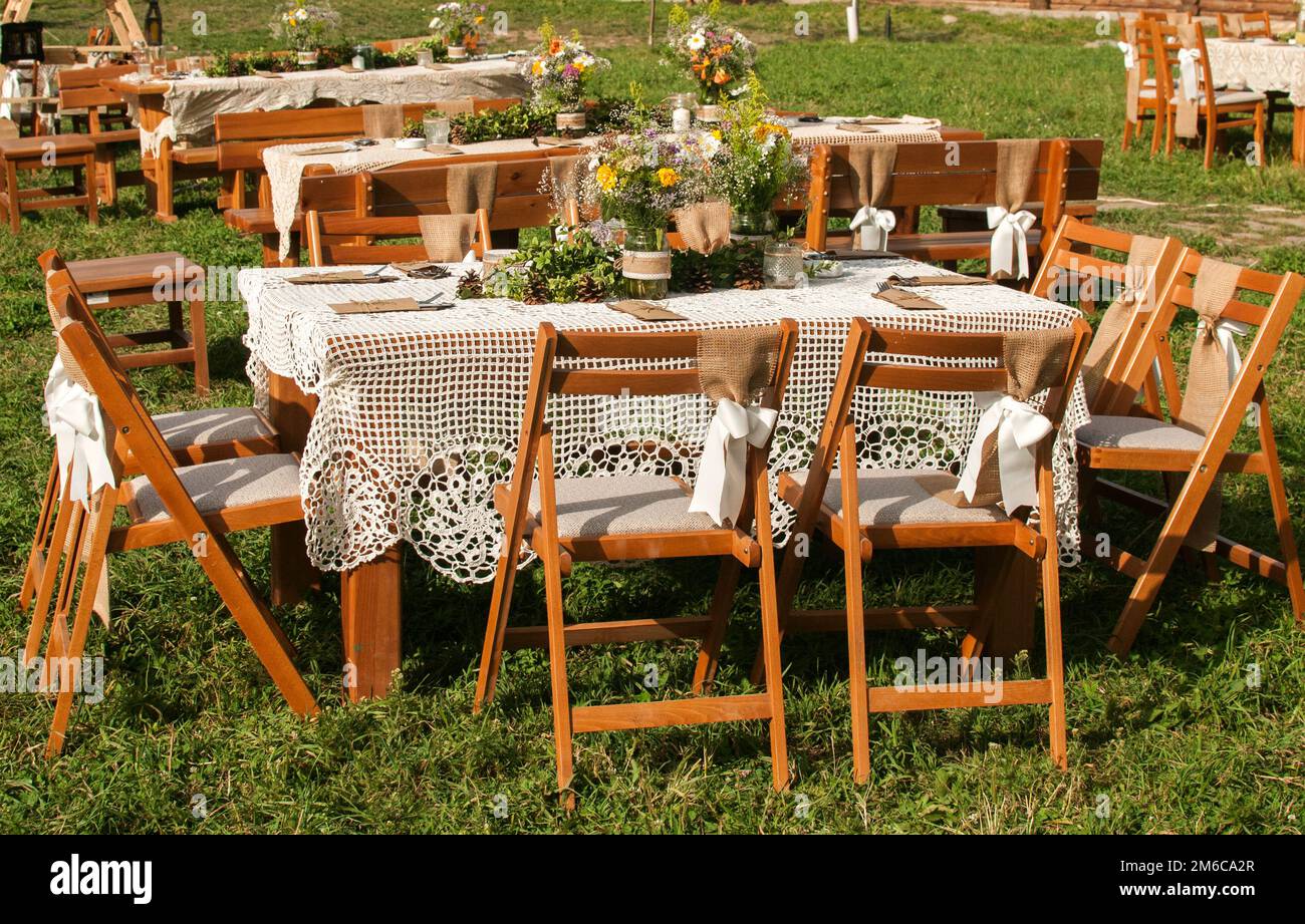 Samaple Table Guest Stacked tables for guests for rustic outdoor wedding ceremony of green ...