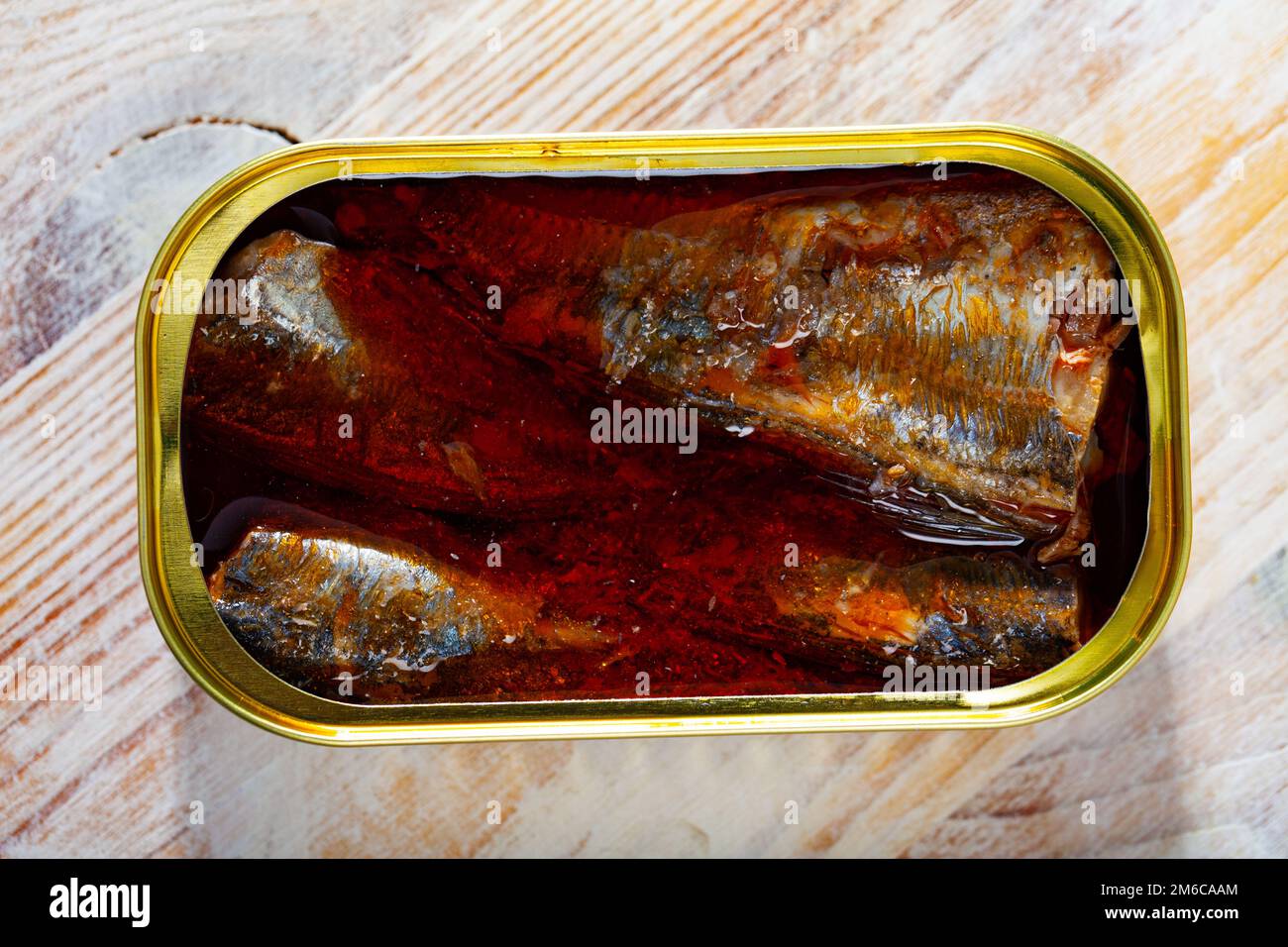 Open tin can of spicy sardines in aluminium can Stock Photo Alamy