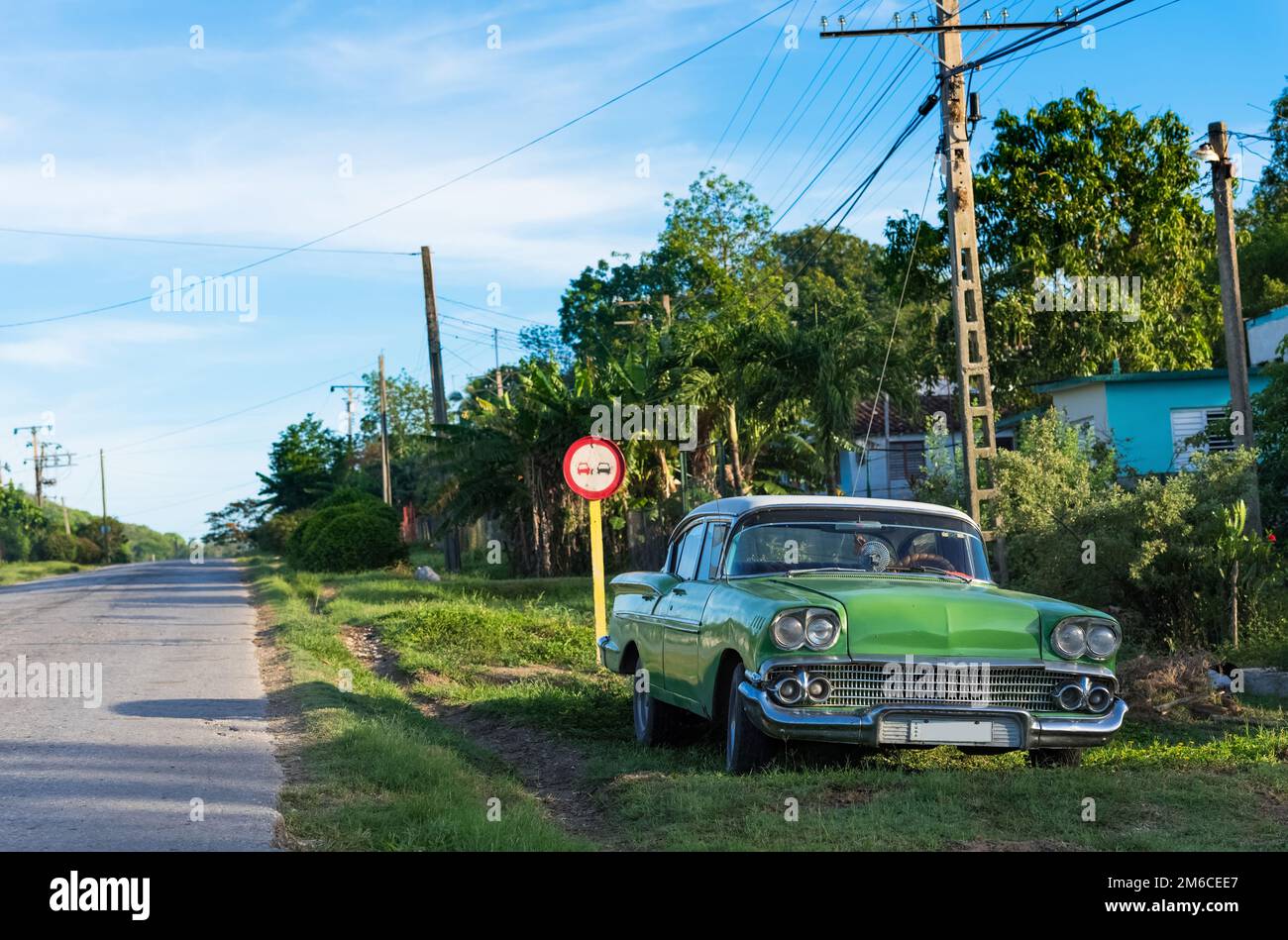 American green classic car parked on the side strip in Matanzas Cuba - Serie Cuba Reportage Stock Photo