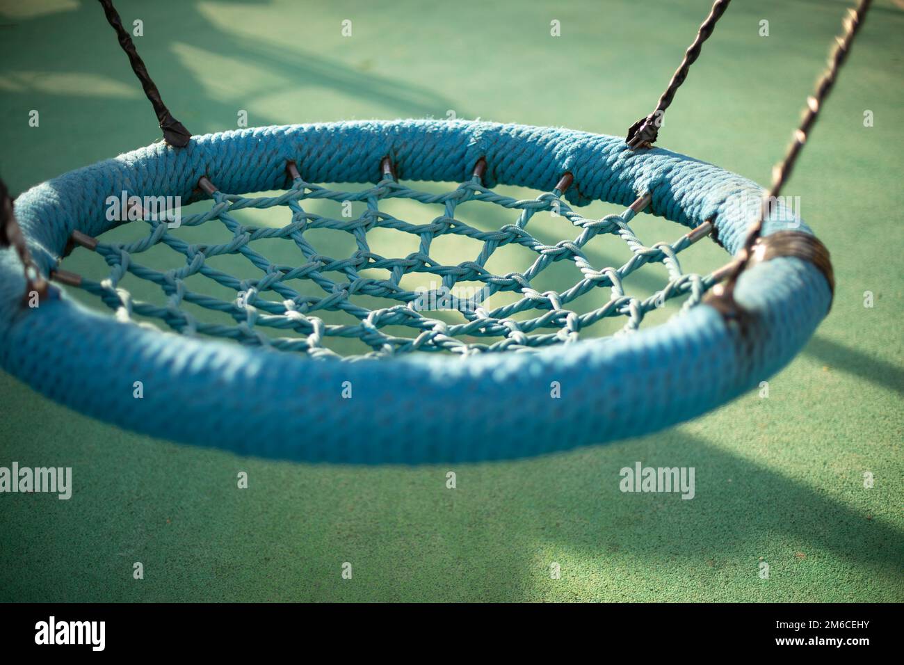 Round swings for children. Swings on ropes Stock Photo Alamy