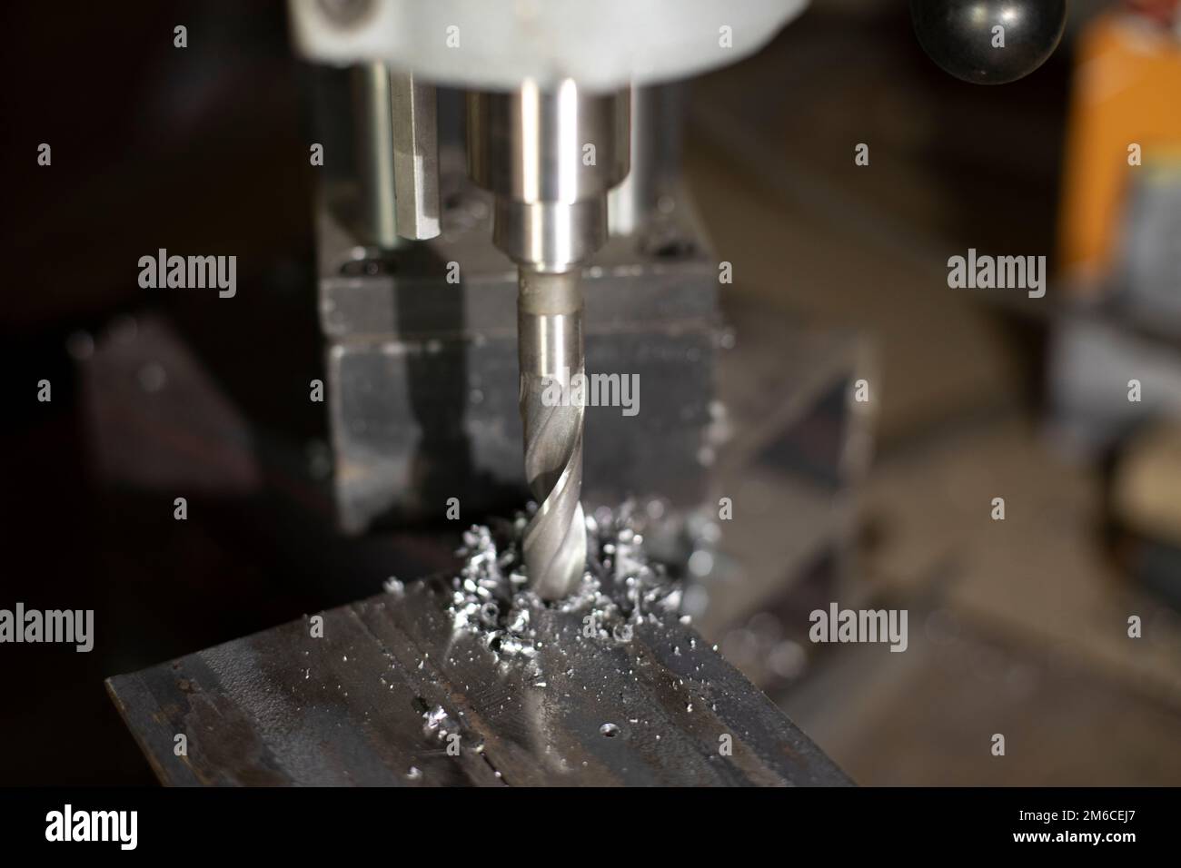 Metal drilling. Large drill bits steel. Production details Stock Photo