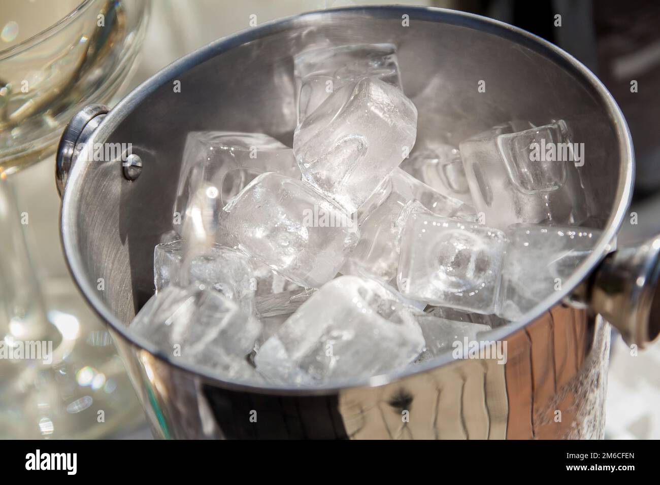 Bucket with ice cubes Stock Photo Alamy