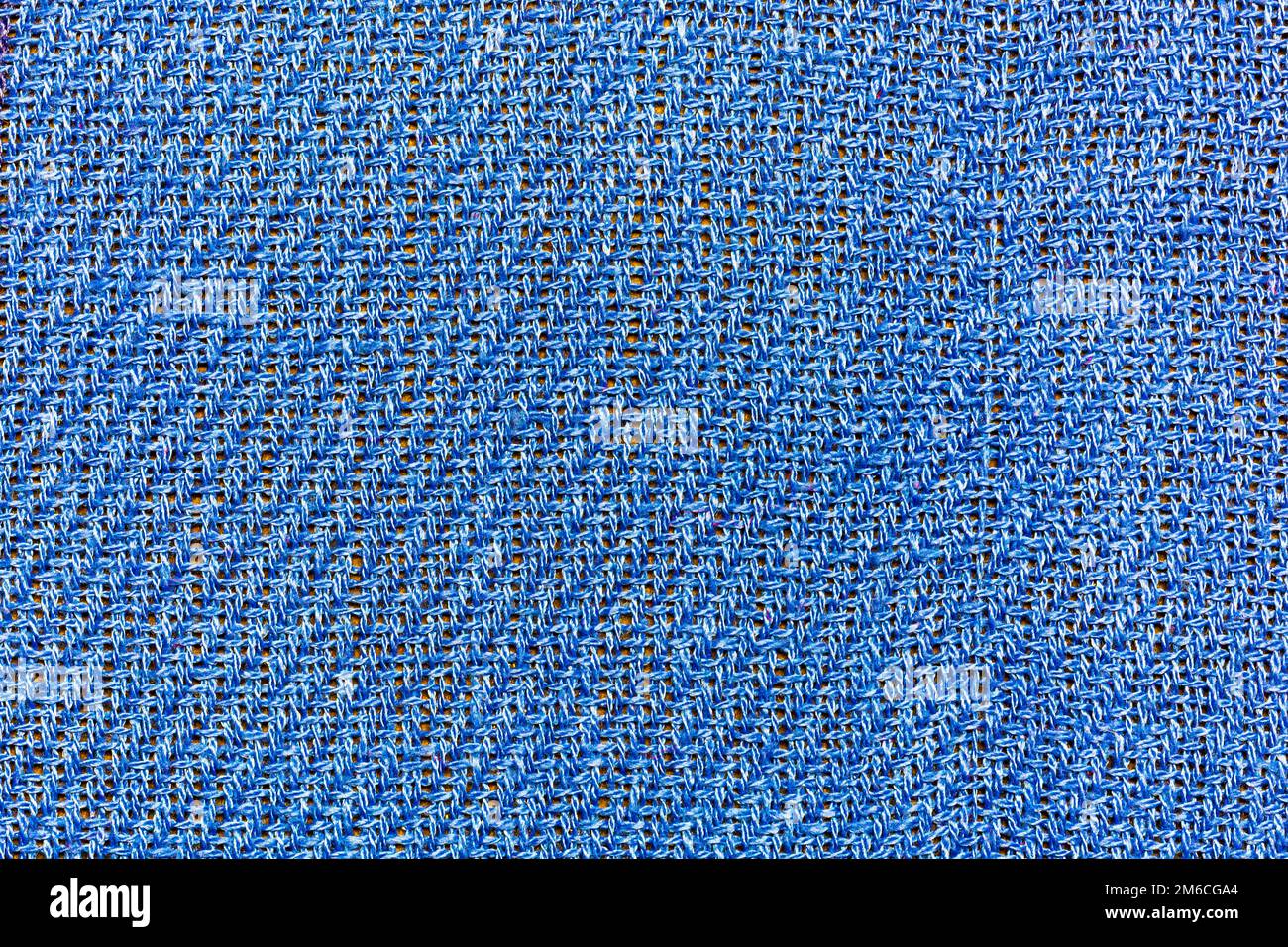 Background, texture, blue fabric closeup with interwoven strands Stock Photo