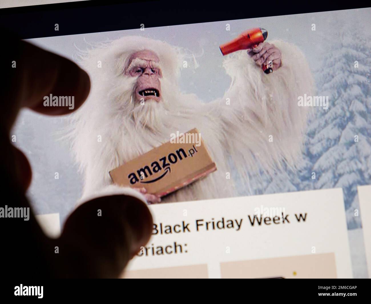 Paris, France - Nov 28, 2022: Male hand over the display of a computer - Amazon Prime Polska Polish website Black Friday is ending at midnight on the Amazon website of the online e-commerce giant Stock Photo