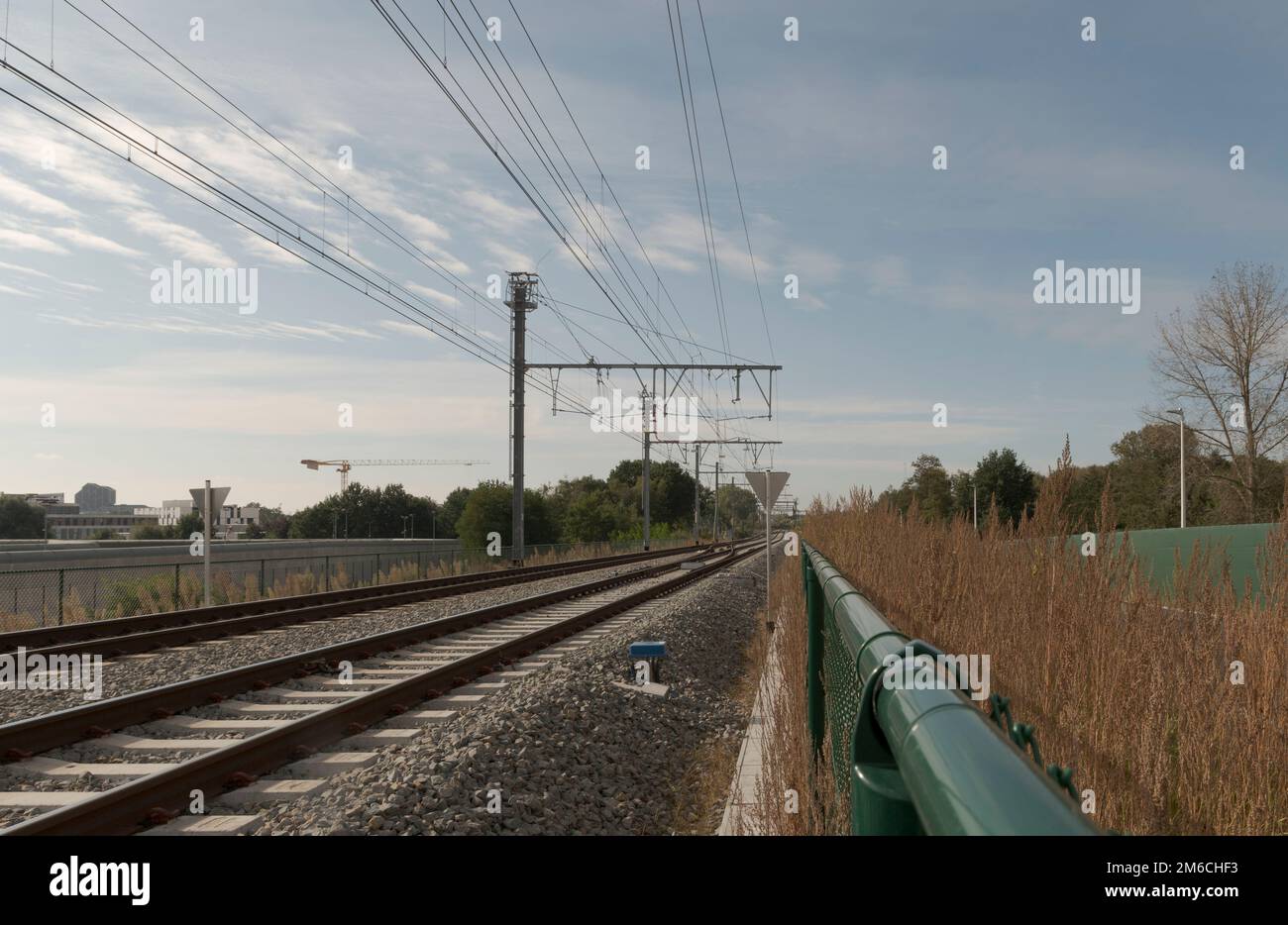 Fencing of railway tracks in the countryside Stock Photo
