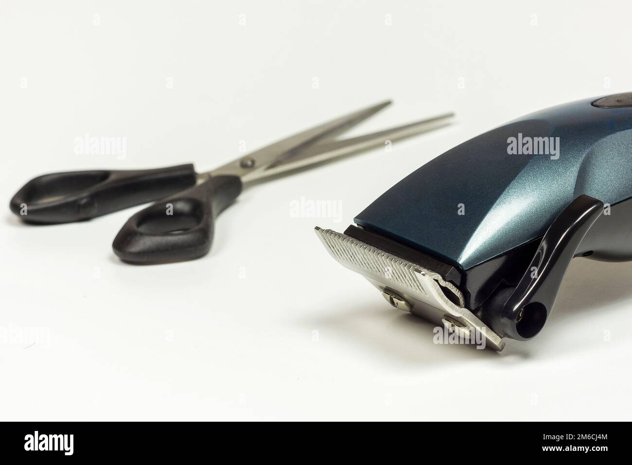 Hair clipper and scissors close up with blur elements Stock Photo Alamy