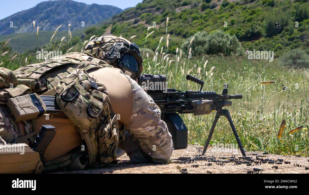 U.S. Army Green Berets assigned to 10th Special Forces Group (Airborne) attend a range with Greek, Albanian, and British Special Operating Forces (SOF) Nea Peramos, Greece May 9, 2022. The training was part of Trojan Footprint 22, the premier SOF exercise in Europe that focuses on improving the ability of SOF to counter myriad threats, increases integration with conventional forces and enhances interoperability with NATO allies and European partners. (U.S. Army photo by Sgt. Claudia Seal) Stock Photo