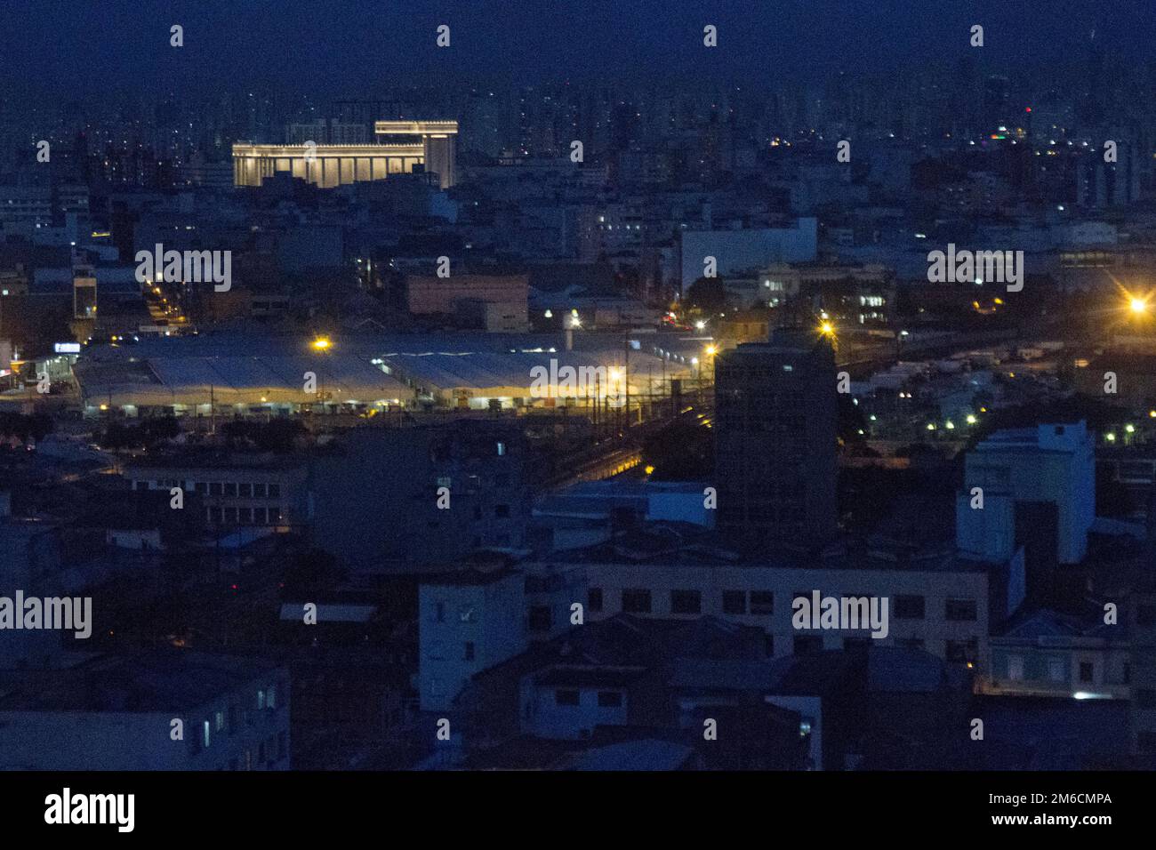 Religious temple stands out in the city night. Stock Photo