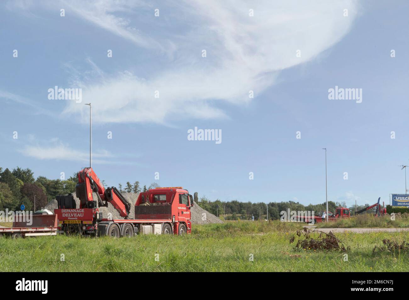 Hasselt. Limburg -Belgie 18-09-2021. A tow truck for depositing cars in the parking lot. Blue sky Stock Photo