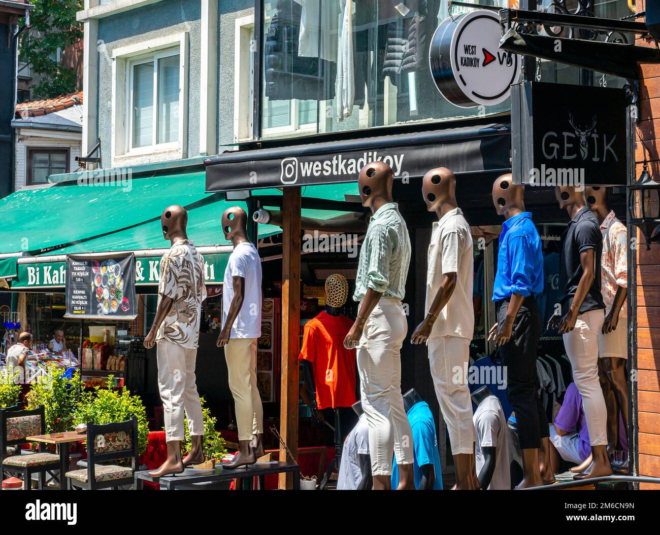Mannequins with holes in their head sets dressed in modern clothing, street wear. Street shop Westkadikoy in Kadikoy, Istanbul, Turkey Stock Photo