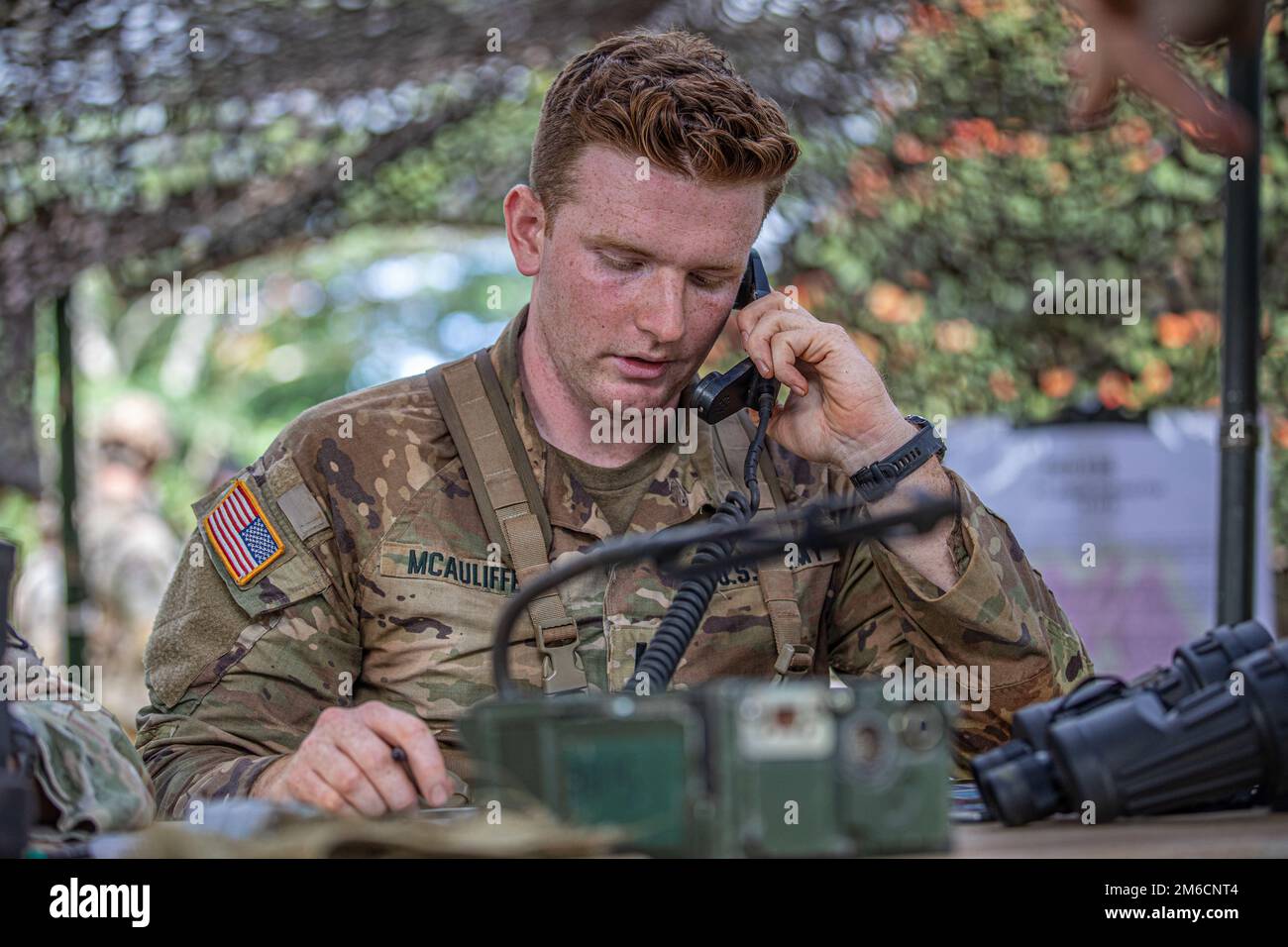 1st Lt. Gavin McAuliffe, 1st Battalion, 21st Infantry Regiment, 2rd Brigade  Combat Team, 25th Infantry Division, calls over the radio to give a report  for the Expert Infantryman Badge / Expert Soldier