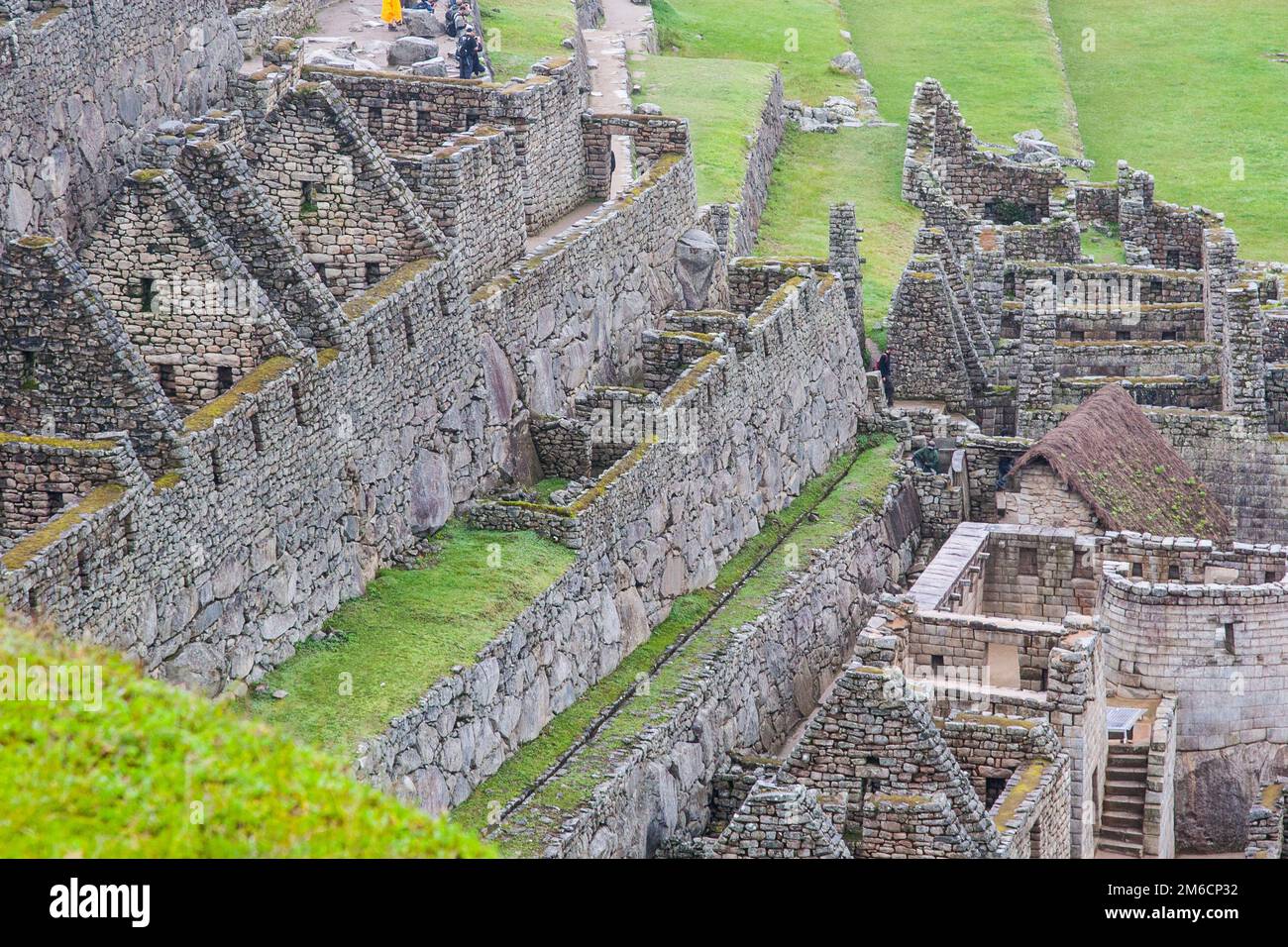 Ruins of houses and farming Inca terraces. Stock Photo
