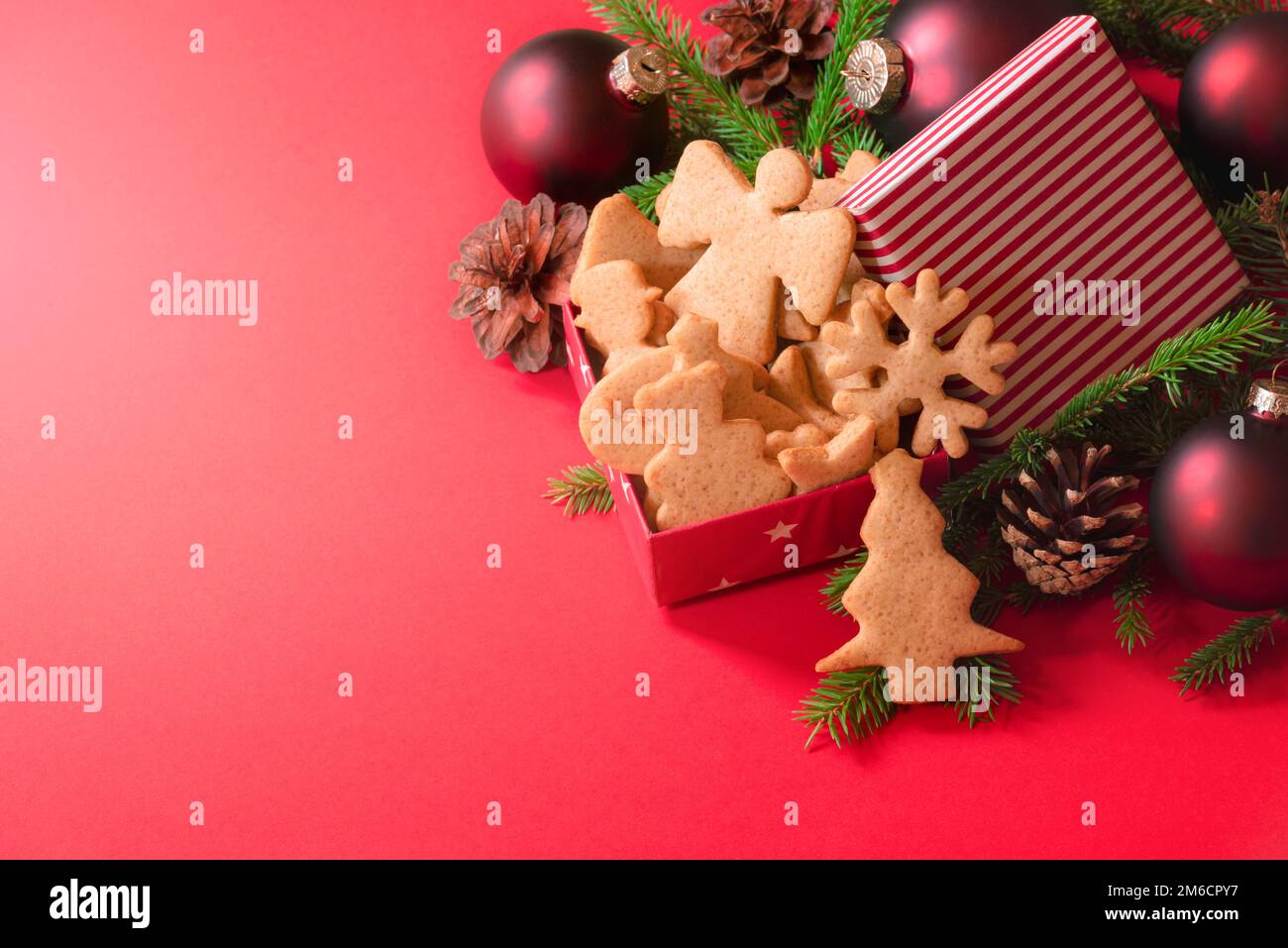 Christmas ginger cookies and red balls Stock Photo