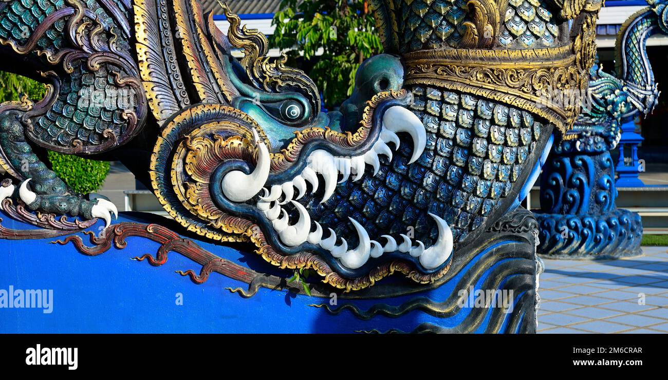 Detail of dragon in Wat Rong Suea Ten, Temple of the Dancing Tiger, in the blue buddhist temple -Chiang Rai-Thailand Stock Photo