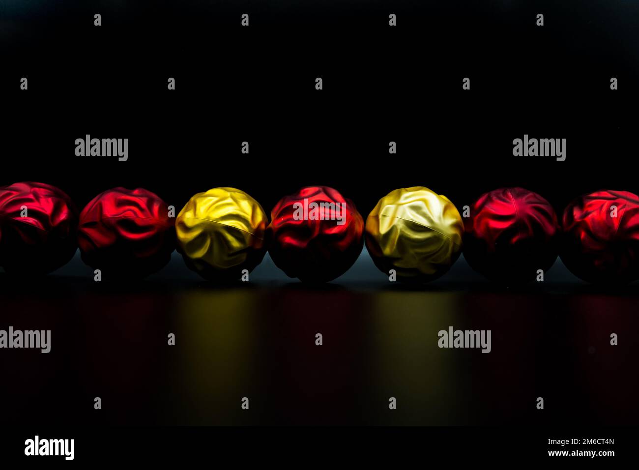 Red and yellow balls hi-res stock photography and images - Alamy