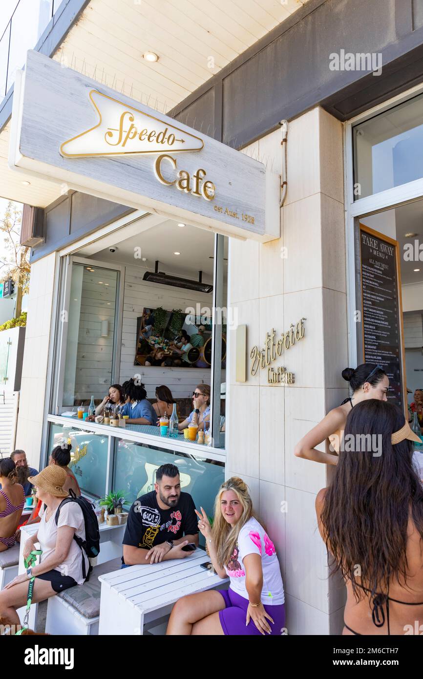 Young people at Speedo cafe in Bondi Beach Sydney ordering food and